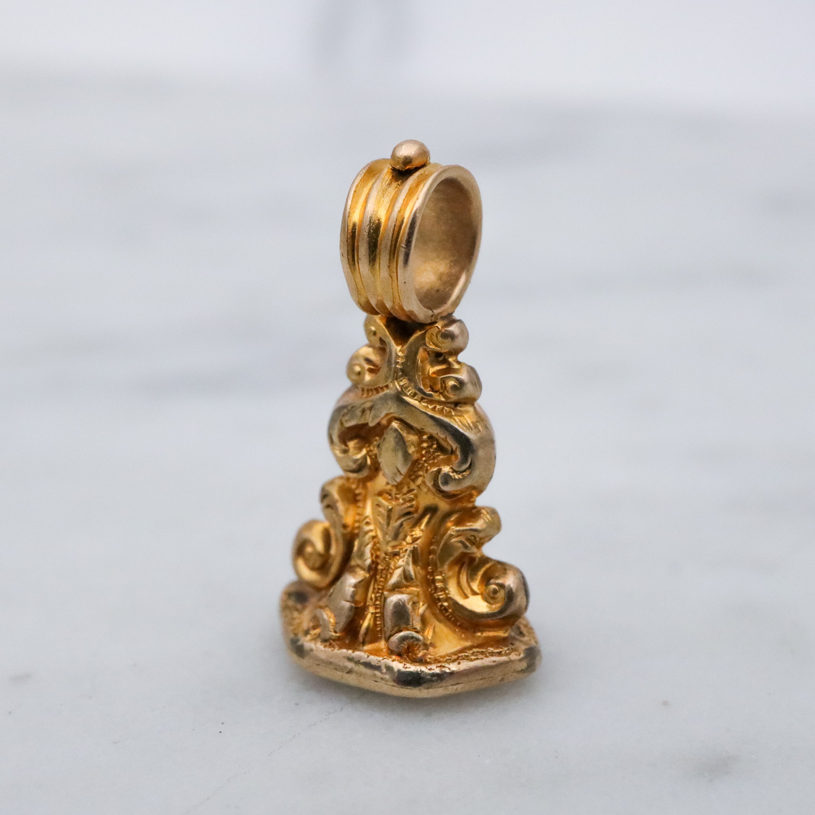 Antique Victorian 10k gold Rococo embossed fob w/quartz signet base